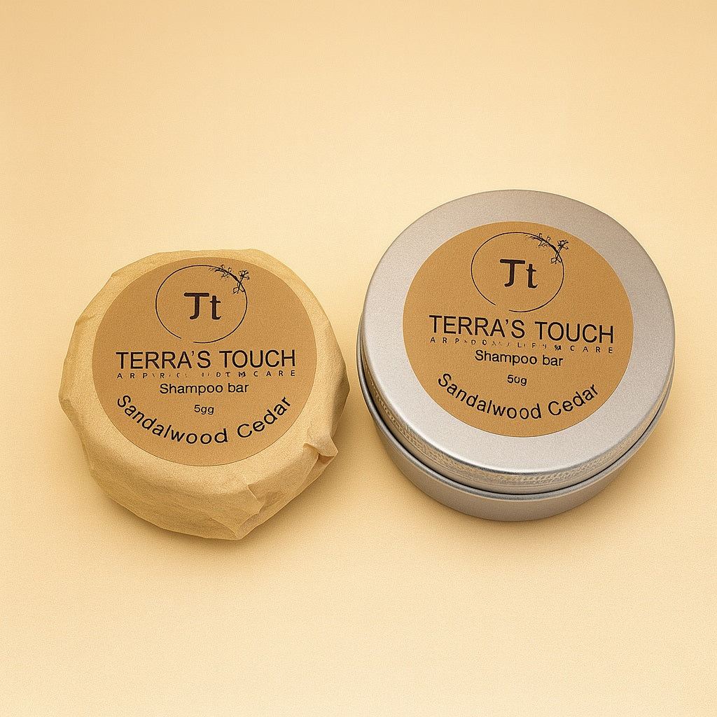 sandalwood cedar shampoo bar in travel tin and paper wrapper