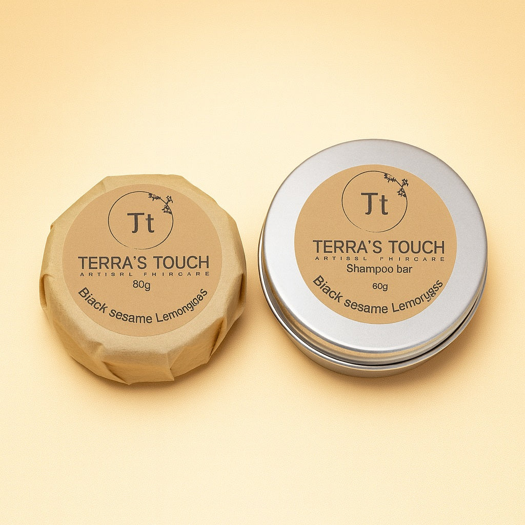 Black sesame lemongrass shampoo bar in travel tin and paper wrapper