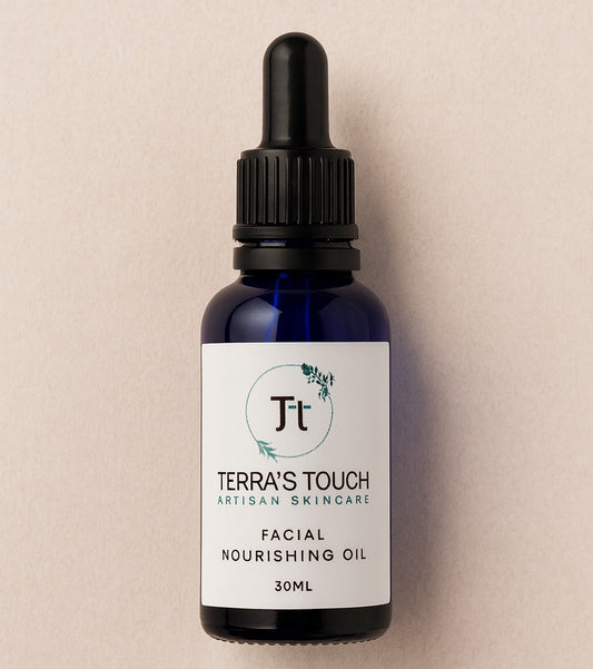 facial nourishing oil in a blue 30ml bottle with black dropper 