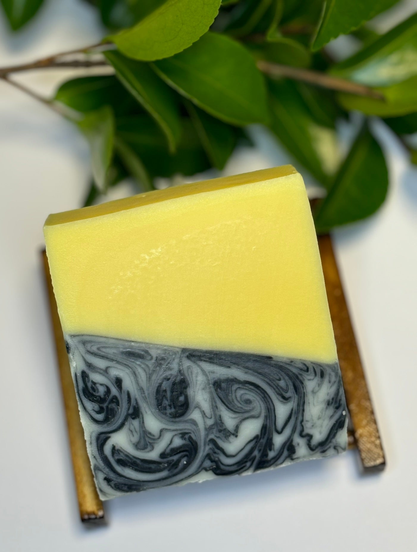 handmade natural soap swirled with charcoal and cedarwood essential oil