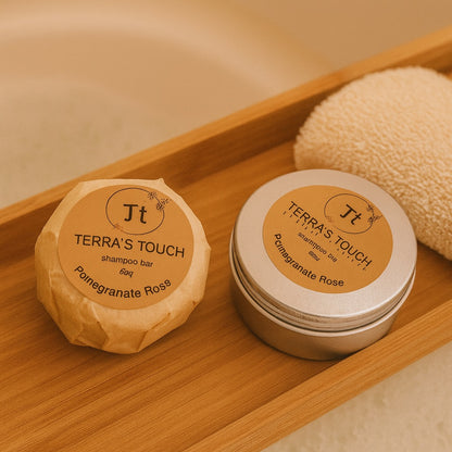 Pomegranate rose shampoo bar on a wooden bench. travel tin and paper wrapper