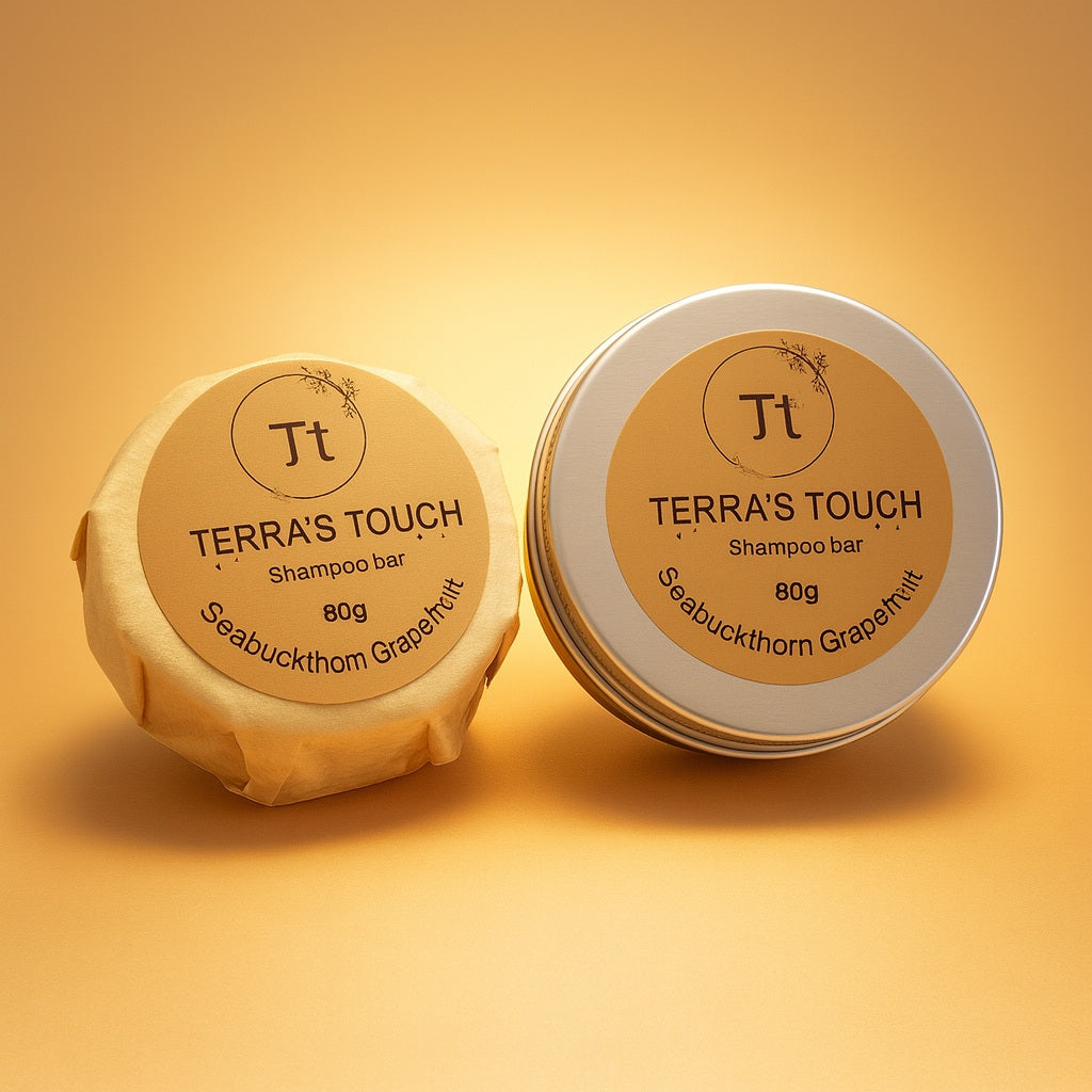 2 shampoo bars, one in travel tin and one in paper wrapping