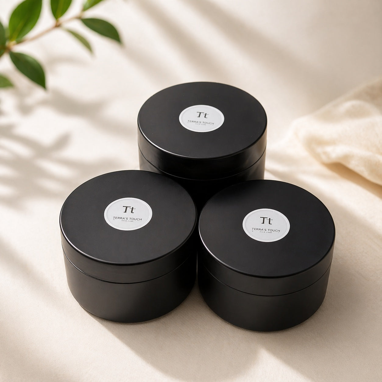 3 jars of emulsified sugar scrubs on a light background